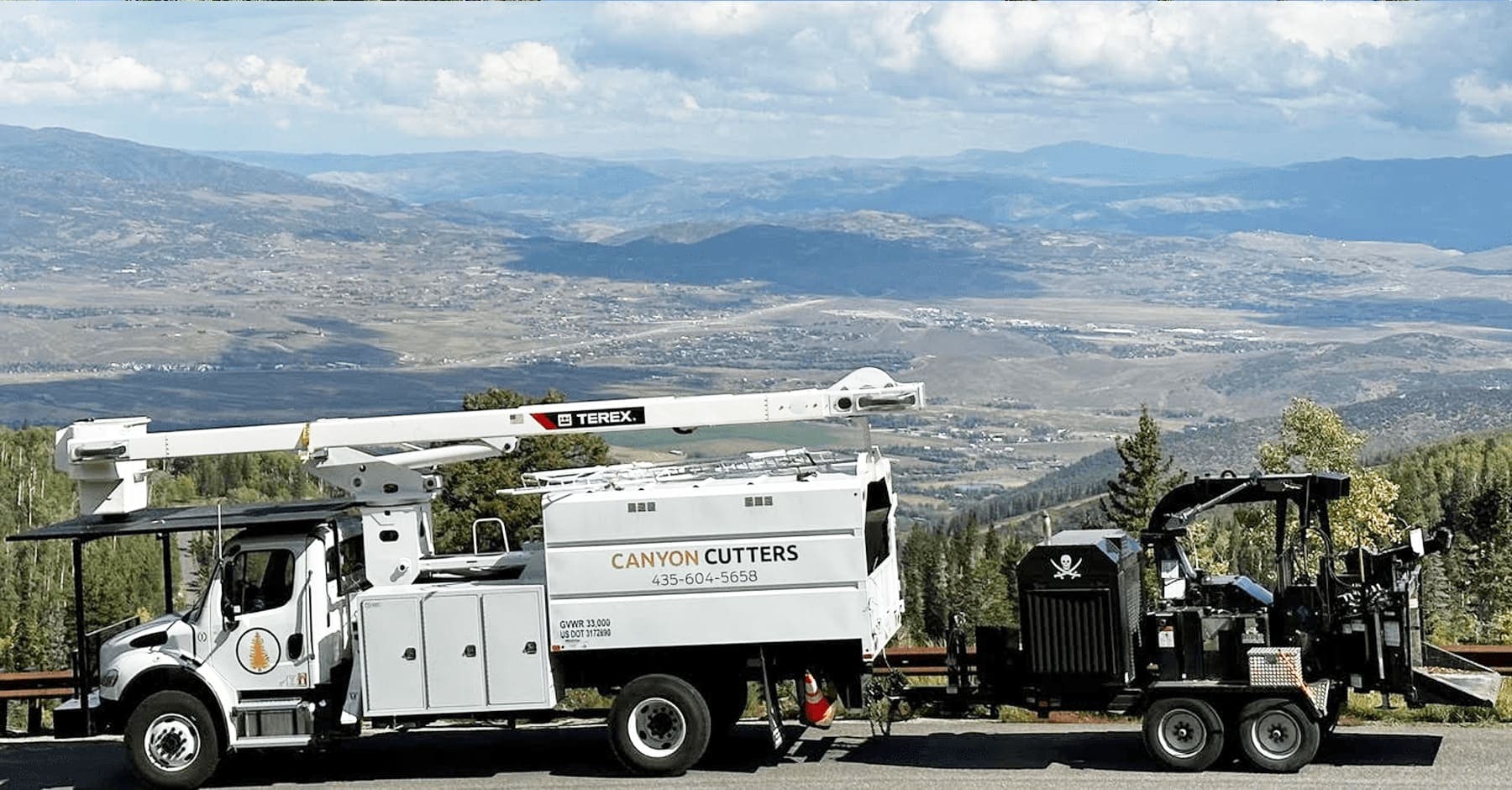 Canyon Cutters bucket truck staged for a tree removal in Park City